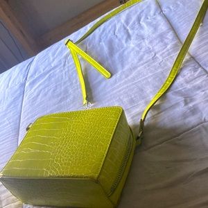 A lime green crossbody purse 👜